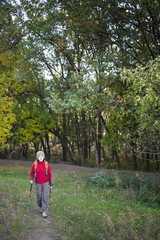 Fototapeta premium A woman with a backpack.