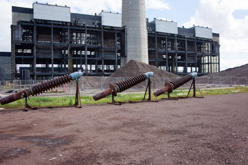 Insulators lined up behind Cockenzie Power Station during demolition, Scotland