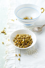 Obraz na płótnie Canvas Organic chamomile (matricaria chamomilla) for tea