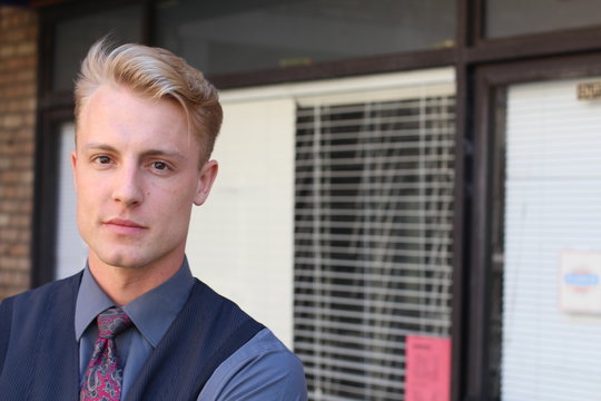 Portait Of Small Business Owner: Proud Young Man And His Store