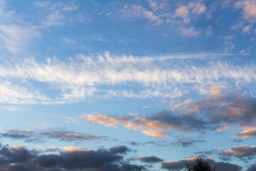 Fototapeta premium Colorful clouds against a blue sky