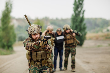 rangers with weapon captured journalist hostage