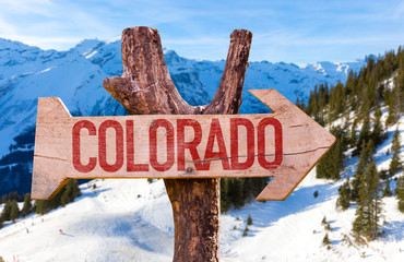 Colorado wooden sign with winter background