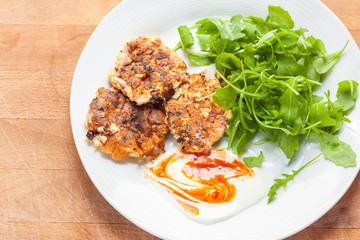 Breakfast popovers with rocket and chill and yogurt sauce