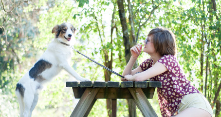 Obraz premium dog with her mistress