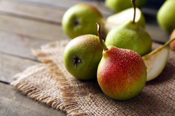 Ripe tasty pears on table close up
