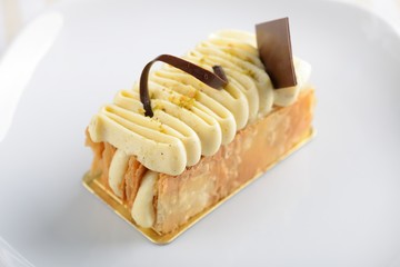 Stock Photo:
Piece of cake napoleon on white plate