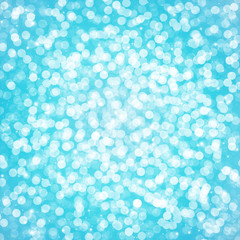 Blue bokeh glitter defocused lights abstract background