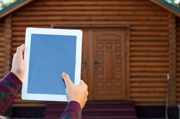 Woman clicks on screen tablet computer