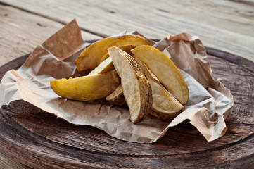 Fried potatoes on rustic