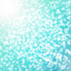 Blue bokeh glitter defocused lights abstract background