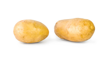 Two whole yellow potatoes isolated