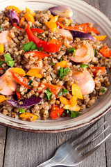 Buckwheat with sausages and vegetables