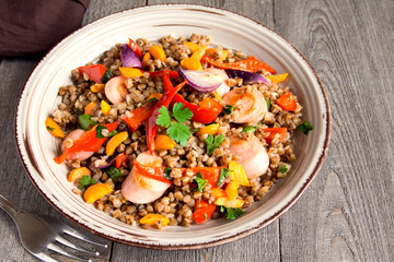 Buckwheat with sausages and vegetables