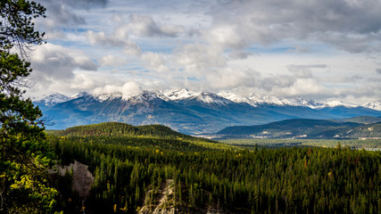 Fototapeta na wymiar Athabasca River Valley in Jasper National Park with the Whistlers and Pyramid Mountains in the background