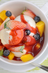 Pavlova dessert with mango berry strawberry