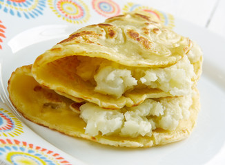 Qistibi. roasted flatbreads with potatoes