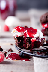 Chocolate cookie with jam and meringue