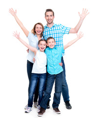 Fototapeta premium Young happy family with children raised hands up