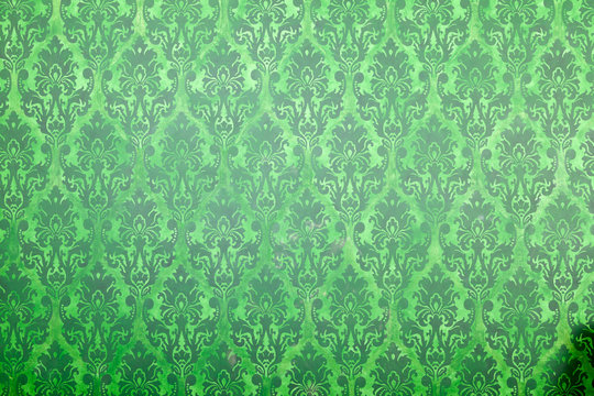 Green vintage pattern on old wall