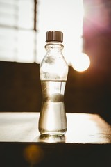 Obraz na płótnie Canvas Water bottle on top of plyo box