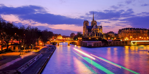 Notre Dame at the river Seine during twilight, Paris, France