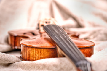 Violin isolated on beige background