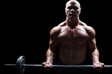 Fototapeta na wymiar Portrait of muscular man lifting crossfit