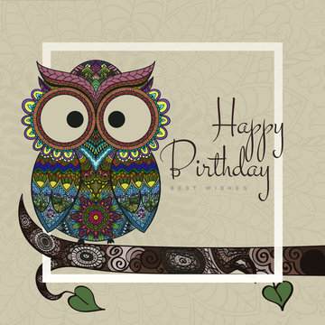 Ornamental owl on the patterned background.