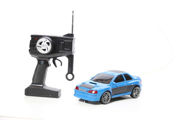 Toy car remote control isolated on white © ruksil