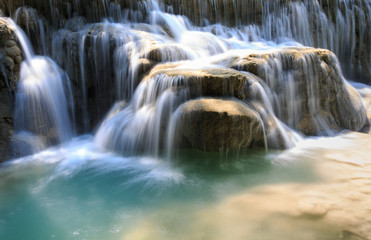 Rushing water flowing over rocks - 93174325