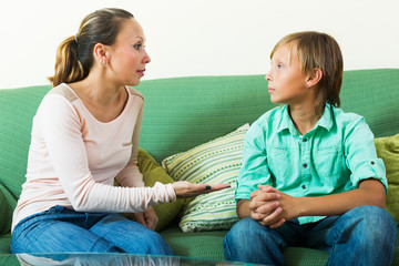 teenager  and  mother having serious talking