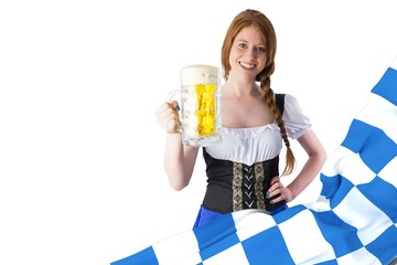 Composite image of oktoberfest girl smiling at camera