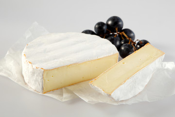 Fresh camembert sliced through to show the center