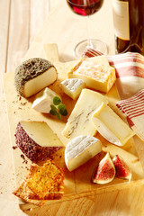Delicious assortment of cheese on a platter