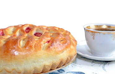 The photo shows the cherry pie and white cup of coffee on a table close up isolated on a white background