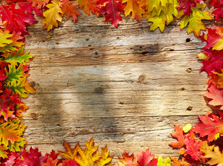 Autumn leaves on a wooden table. Background style