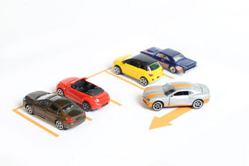 Fototapeta na wymiar Toy cars on parking