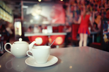 cup of tea at a cafe blurred background