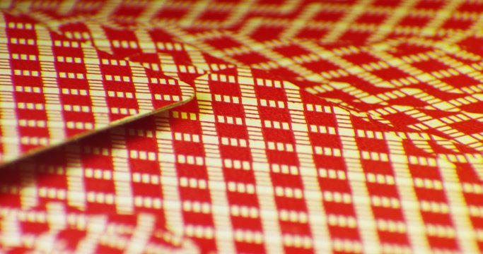 Various playing card background. Loop rotation on the table. Macro shot 4K