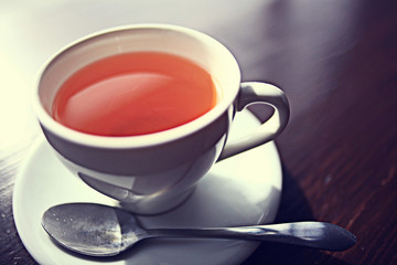 cup of tea at a cafe blurred background