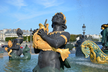 Fototapeta na wymiar Fountain at the Place de la Concorde, Paris, France
