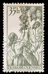Postage stamp printed in Czechoslovakia showing hop plukkers, a base ingredient for brewing beer