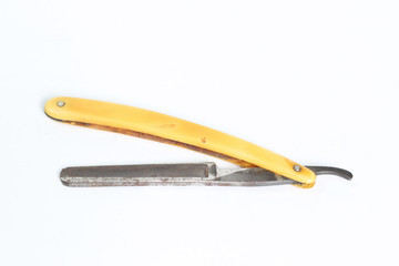 Vintage shaving blade isolated on white background