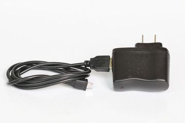 Charger smart phone on a white background.