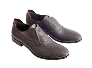 Brown stylish male shoes isolated on white background