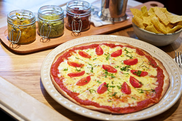 Pizza Margherita on table