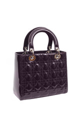 violet luxury female handbag isolated on white background