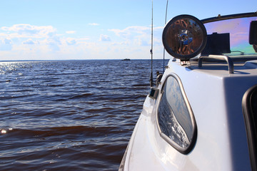 fragment of a motor boat on the lake