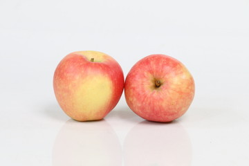 red and yellow apples fruit isolated on white background